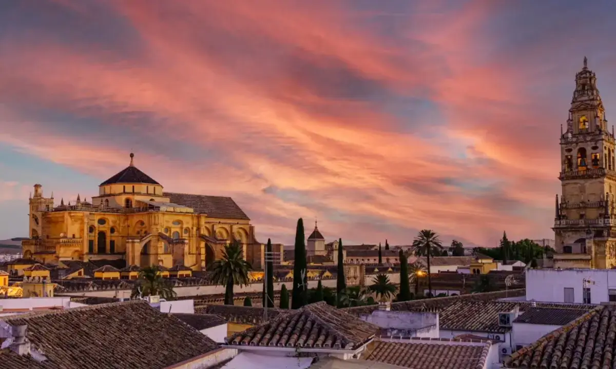 Rooftop terrace of Balcón de Córdoba with panoramic views of the Mezquita-Catedral bell tower