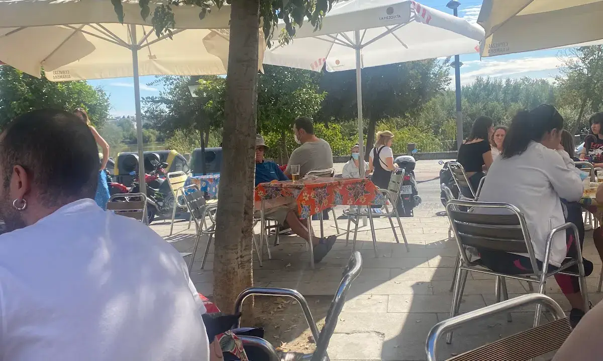 Bar Amapola interior with retro 1970s décor and views over the Guadalquivir