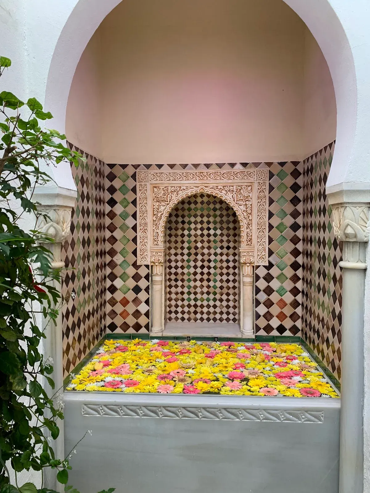 Moorish courtyard of Casa Andalusí with central fountain and citrus trees, Córdoba Judería