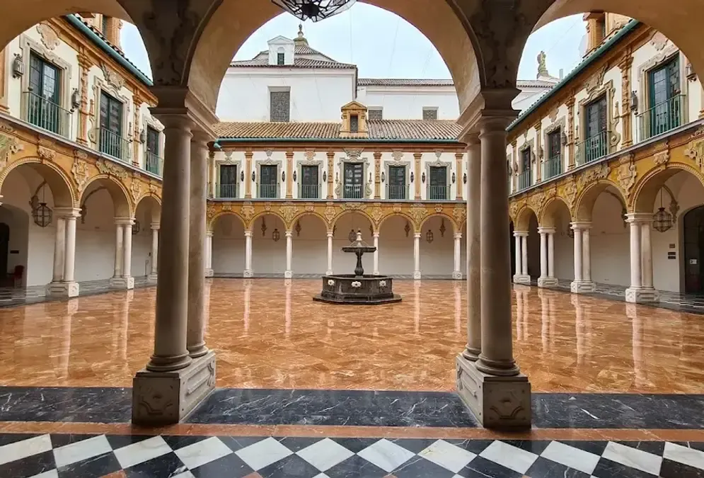 Baroque facade of the Palacio de la Merced with bell tower and inner courtyard