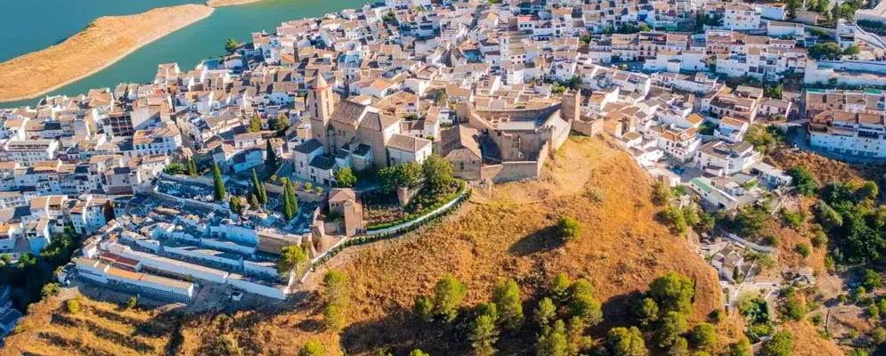 Iznájar reservoir and white village, Andalusia's largest lake